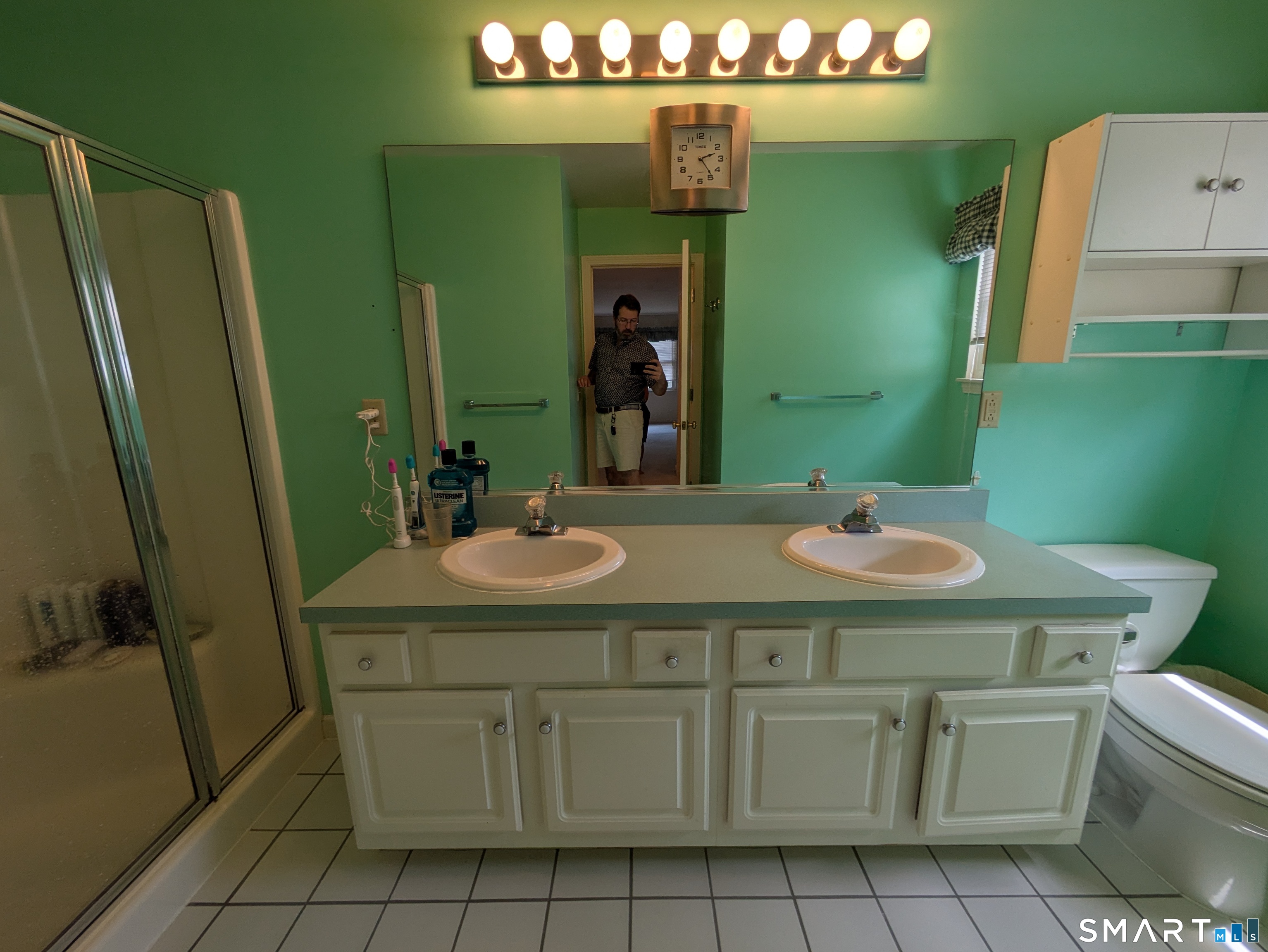 61 Basking Brook Road Shelton, CT 06484 - Photo 12 of 25 a bathroom with a sink and a mirror