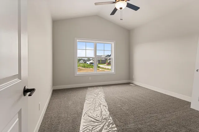 a bathroom with double sink and a mirror