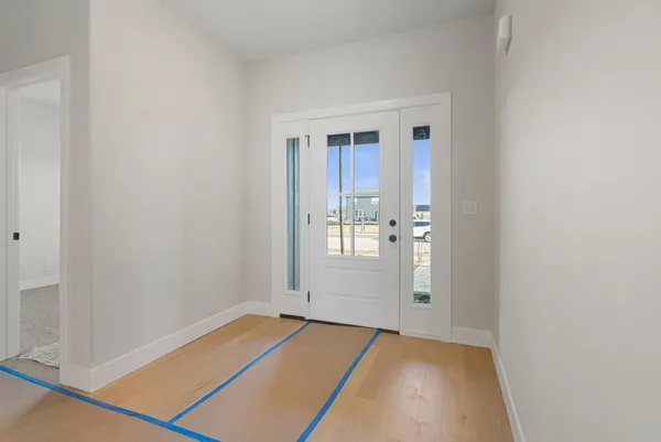a view of a kitchen with furniture and a ceiling fan