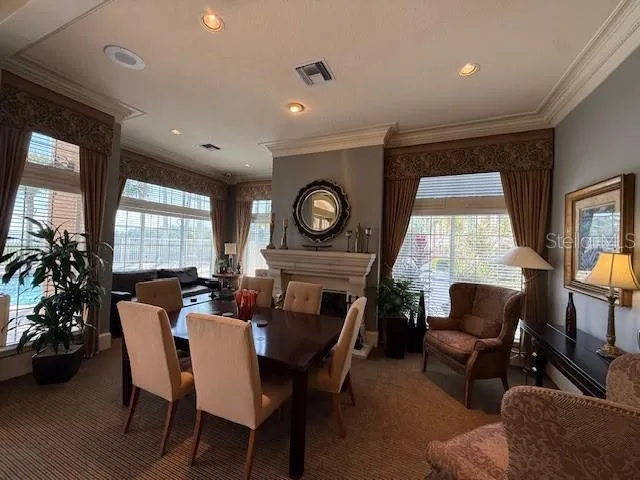 a view of a chairs and table in patio