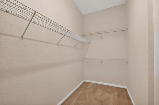 a bathroom with a toilet a sink a mirror and bathtub