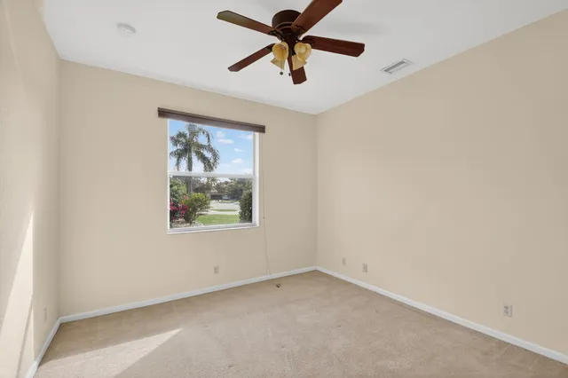 a view of a livingroom with a ceiling fan
