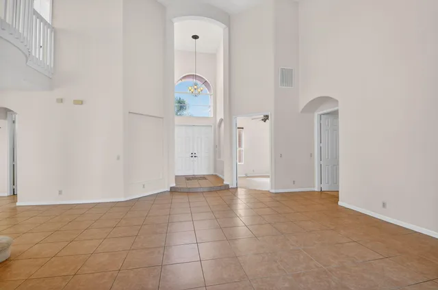 a view of entryway and hall with a window