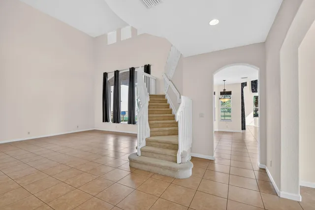 a view of a hallway with a chandelier
