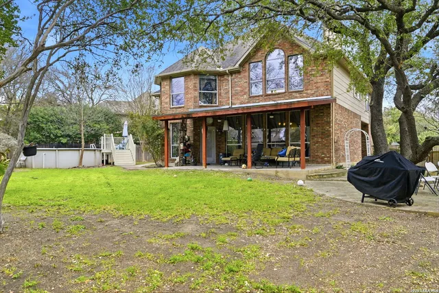 front view of a house with a garden