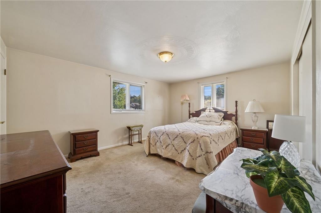 1722 Arona Road Irwin, PA 15642 - Photo 17 of 33 a bedroom with a bed and a desk