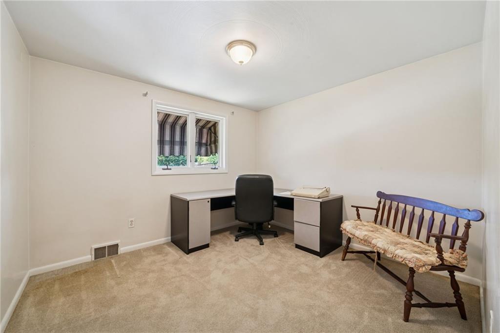 1722 Arona Road Irwin, PA 15642 - Photo 22 of 33 a workspace with furniture and a window