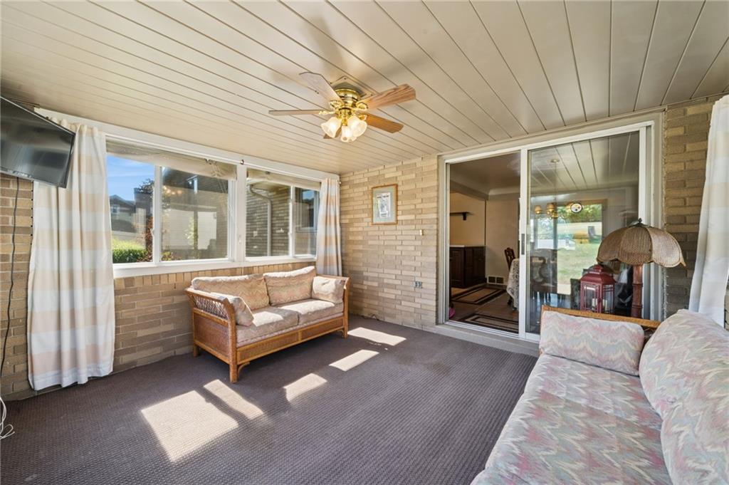 1722 Arona Road Irwin, PA 15642 - Photo 28 of 33 a living room with furniture and a window