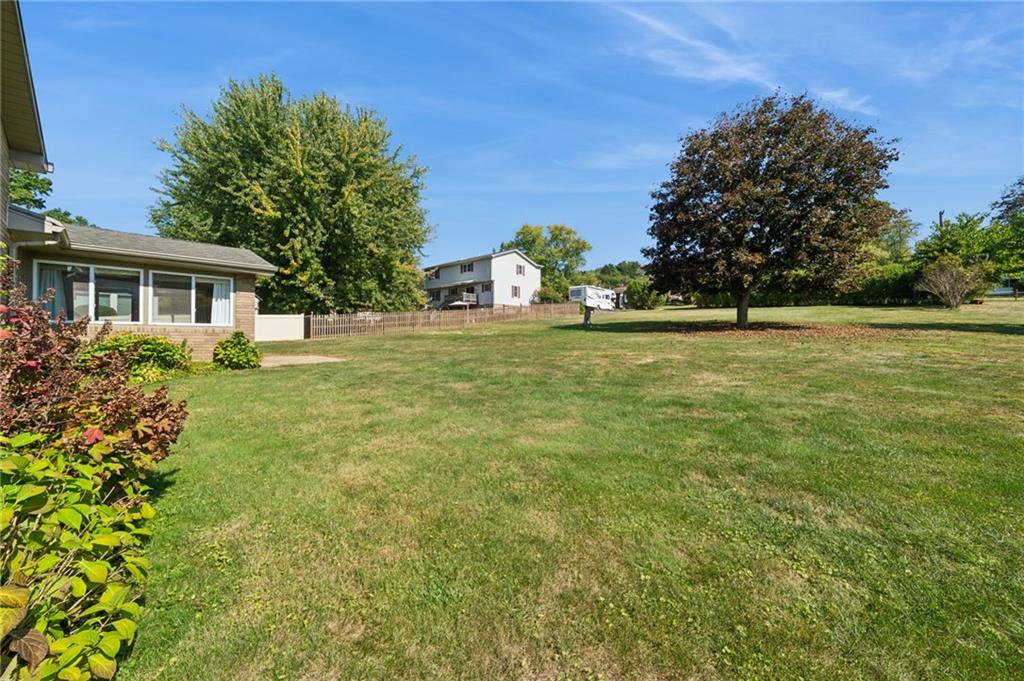 1722 Arona Road Irwin, PA 15642 - Photo 29 of 33 a house view with garden space and trees
