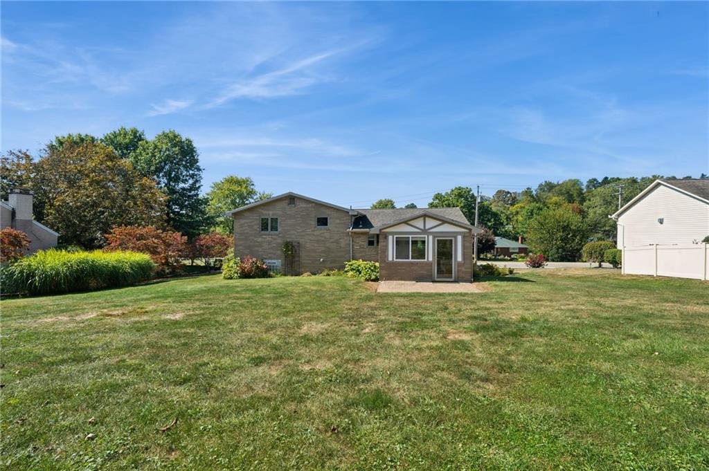 1722 Arona Road Irwin, PA 15642 - Photo 30 of 33 a front view of a house with a yard