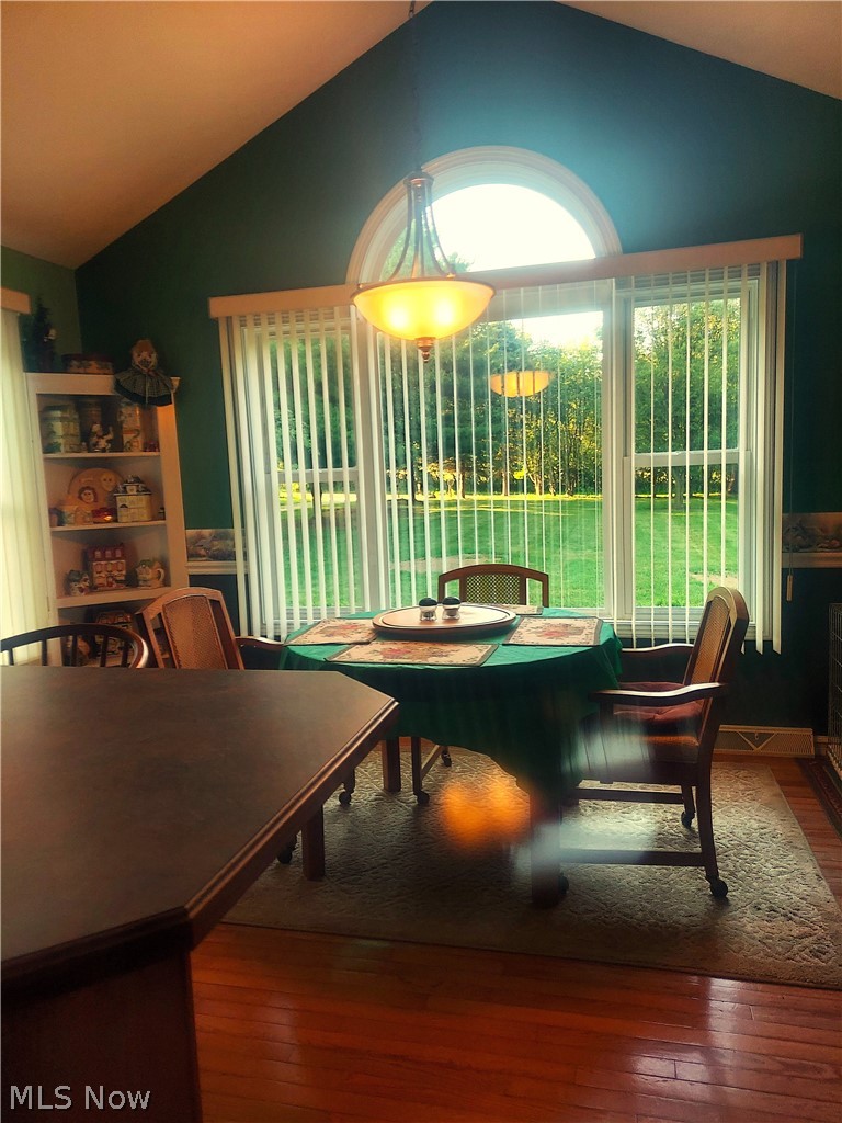 7540 Kennard Road Seville, OH 44273 - Photo 11 of 37 Dinette featuring vaulted ceiling and wood-type flooring