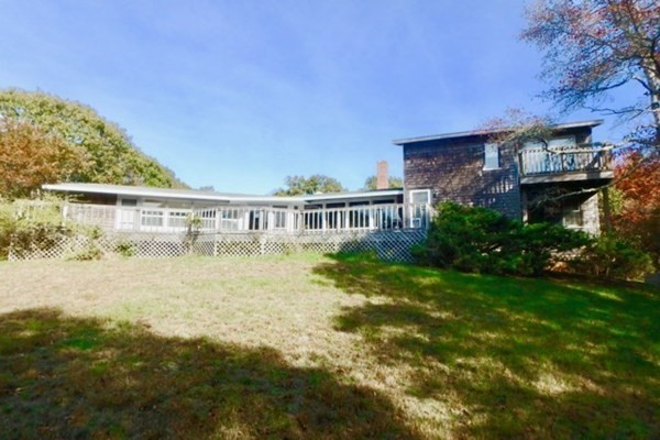 44 Flanders Lane Chilmark, MA 02535 - Photo 14 of 19 a front view of a house with a garden