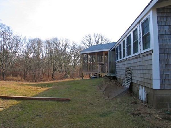 44 Flanders Lane Chilmark, MA 02535 - Photo 18 of 19 a view of a house with a yard