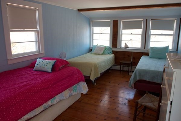 44 Flanders Lane Chilmark, MA 02535 - Photo 6 of 19 a bedroom with two beds and a large window