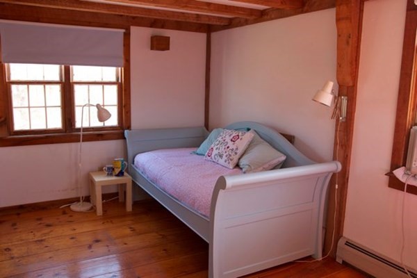 44 Flanders Lane Chilmark, MA 02535 - Photo 7 of 19 a bedroom with a bed and a window