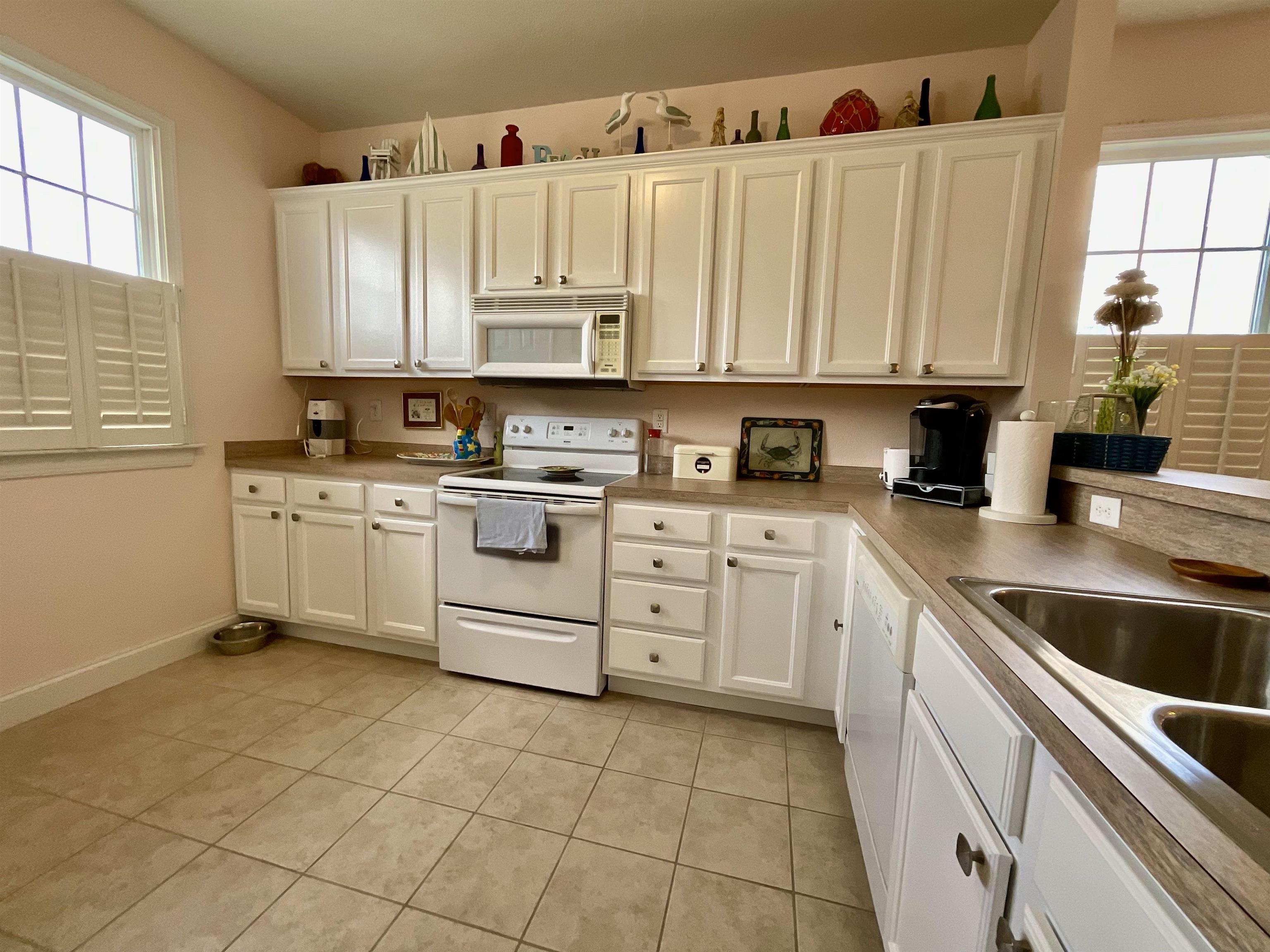 124 Gables Way Kitty Hawk, NC 27949 - Photo 3 of 37 Open kitchen with lots of cabinets and space