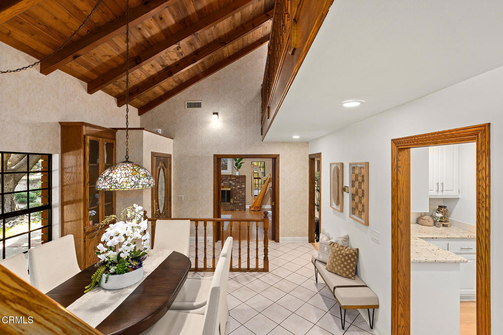 23 Hidden Valley Road Monrovia, CA 91016 - Photo 15 of 27 a living room with furniture and a chandelier