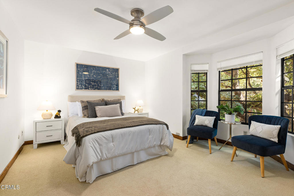 23 Hidden Valley Road Monrovia, CA 91016 - Photo 16 of 27 a bedroom with bed a couch and a window