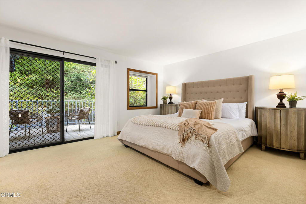 23 Hidden Valley Road Monrovia, CA 91016 - Photo 17 of 27 a bed sitting in a spacious bedroom next to a window