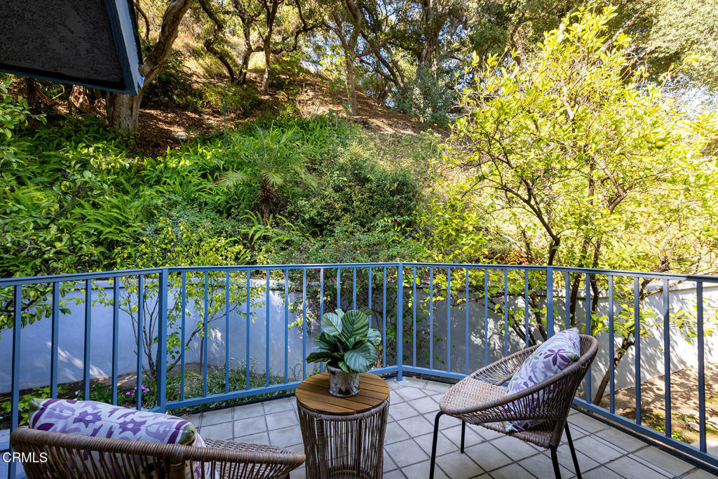 23 Hidden Valley Road Monrovia, CA 91016 - Photo 18 of 27 a view of a chairs and table in the balcony