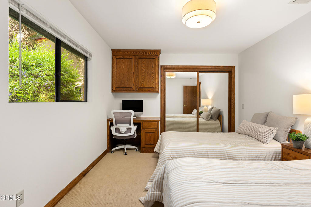 23 Hidden Valley Road Monrovia, CA 91016 - Photo 23 of 27 a bedroom with a bed and a window