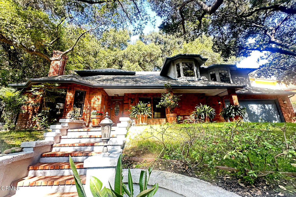 23 Hidden Valley Road Monrovia, CA 91016 - Photo 27 of 27 a front view of a house with a yard