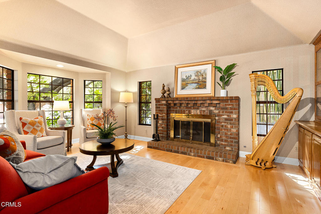 23 Hidden Valley Road Monrovia, CA 91016 - Photo 7 of 27 a living room with furniture and a fireplace