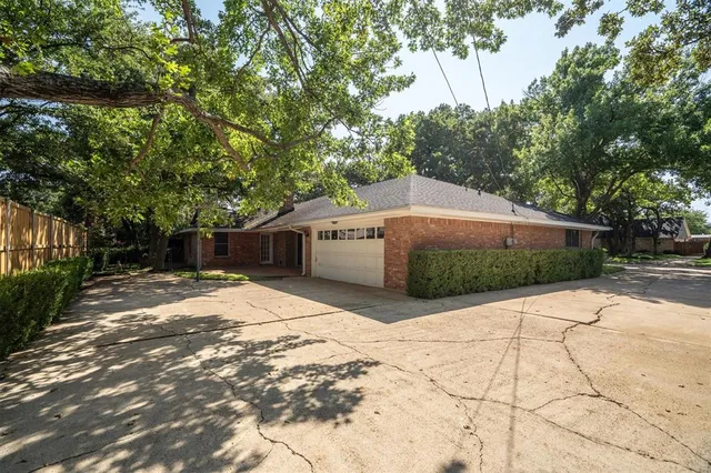 a view of backyard with green space