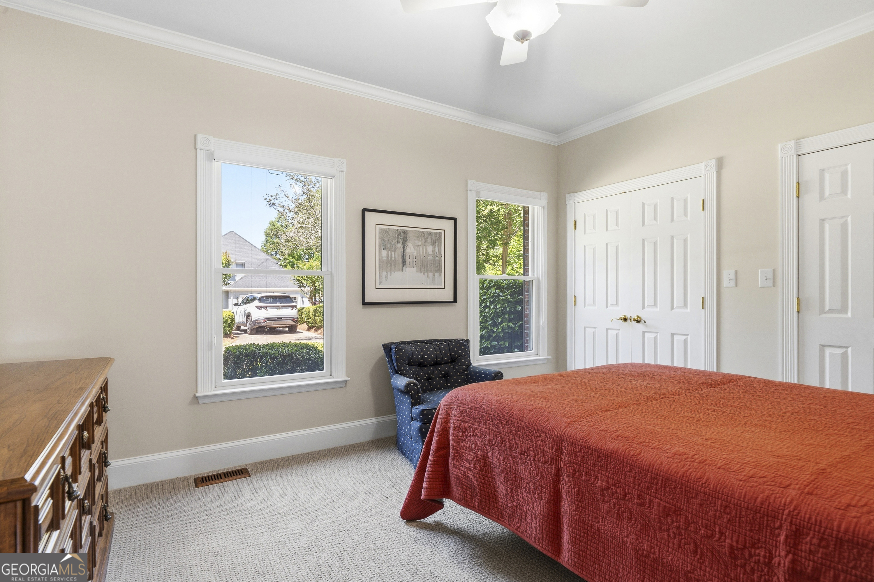 104 Spruce Point Southeast Eatonton, GA 31024 - Photo 29 of 63 a spacious bedroom with a bed and a window