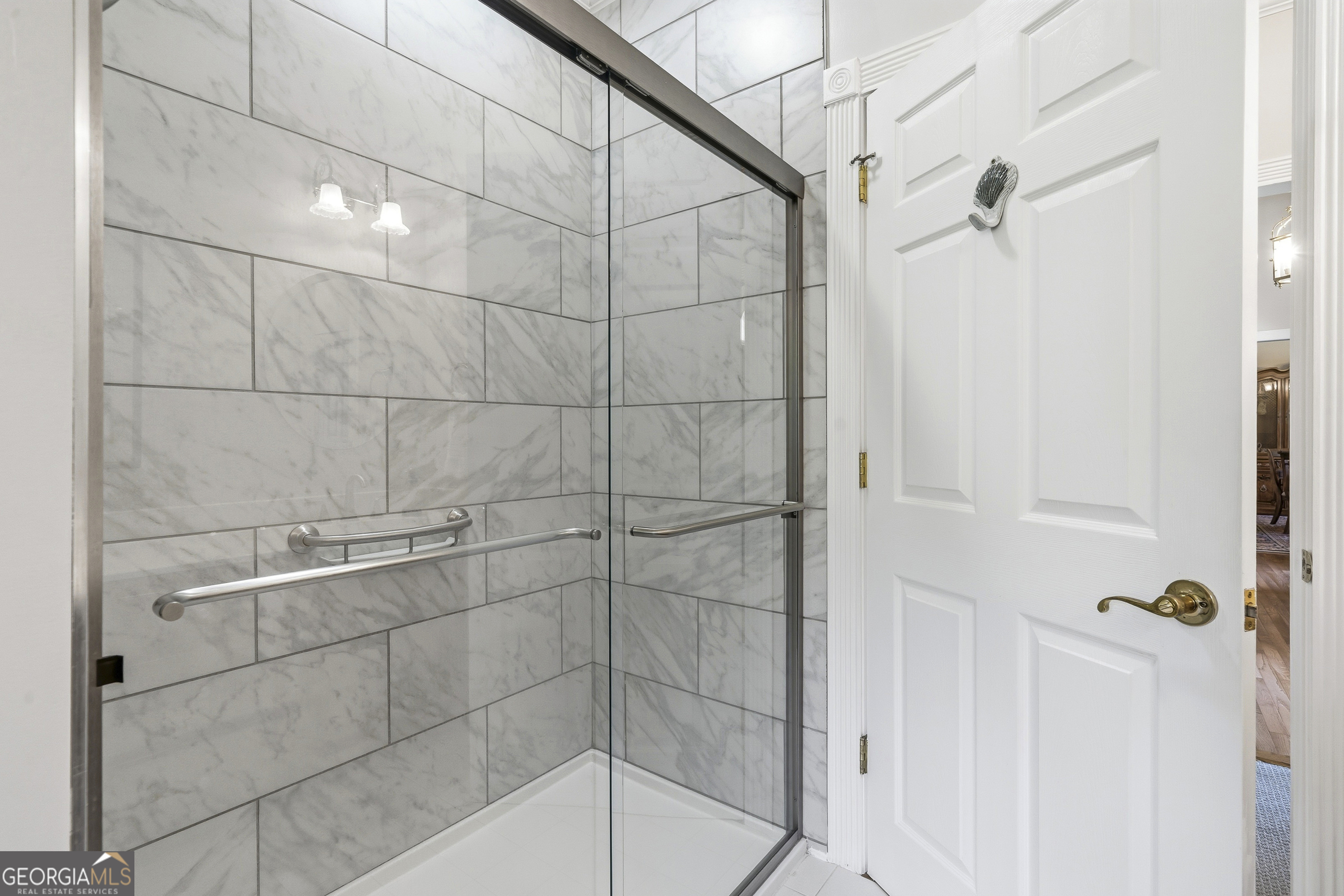 104 Spruce Point Southeast Eatonton, GA 31024 - Photo 32 of 63 a bathroom with a shower