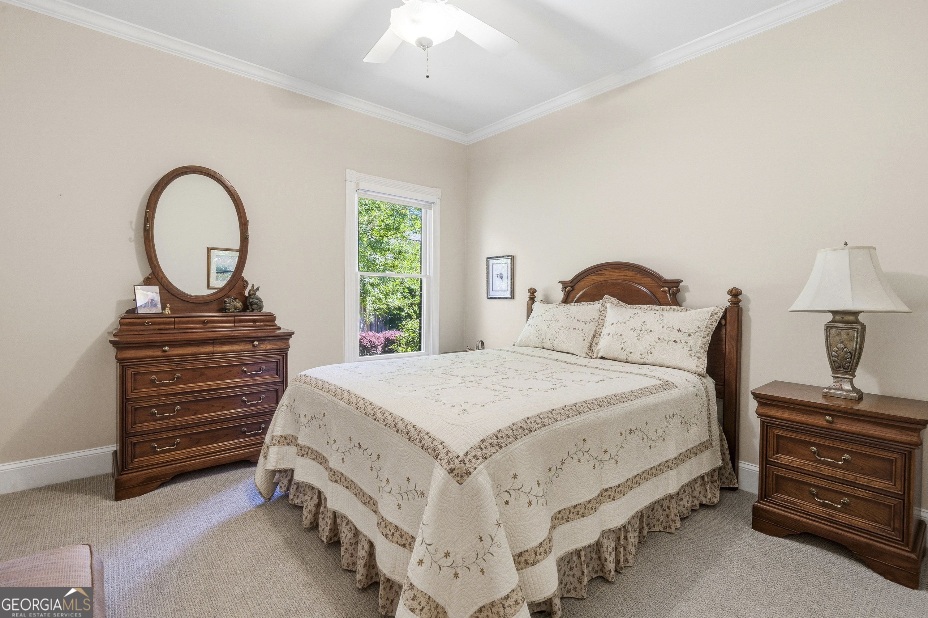 104 Spruce Point Southeast Eatonton, GA 31024 - Photo 33 of 63 a bedroom with a bed and a dresser