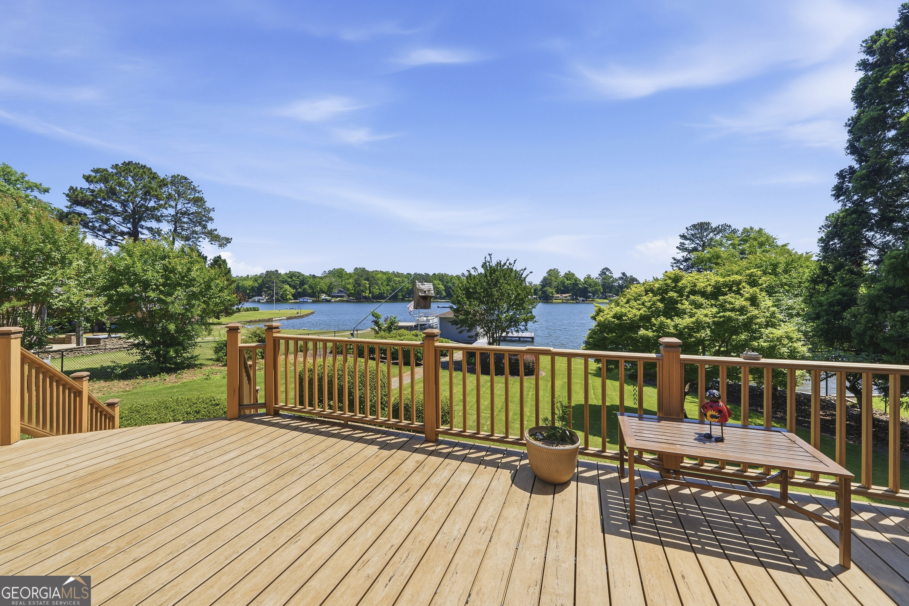 104 Spruce Point Southeast Eatonton, GA 31024 - Photo 38 of 63 a view of balcony with wooden floor and fence