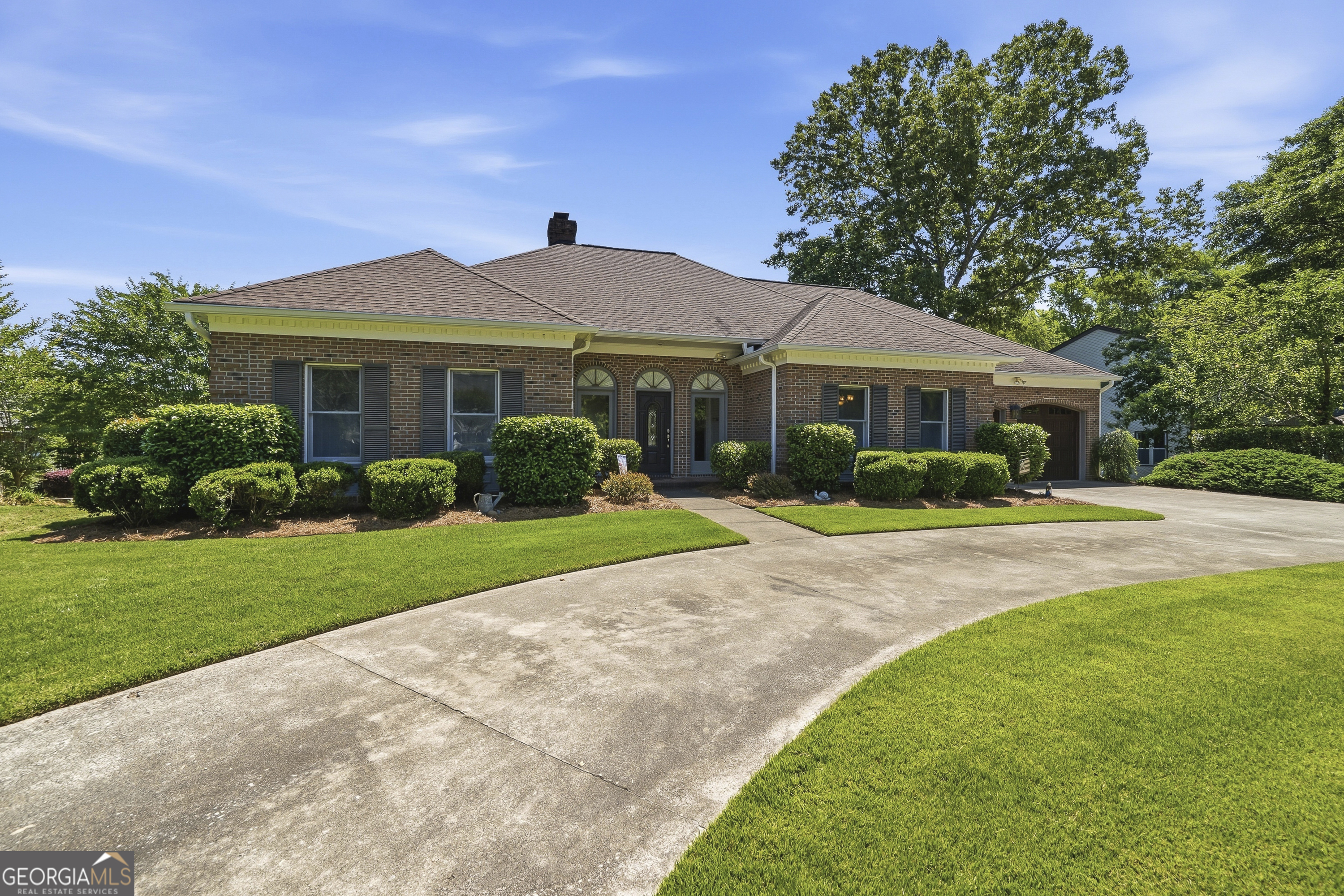 104 Spruce Point Southeast Eatonton, GA 31024 - Photo 51 of 63 a front view of a house with garden