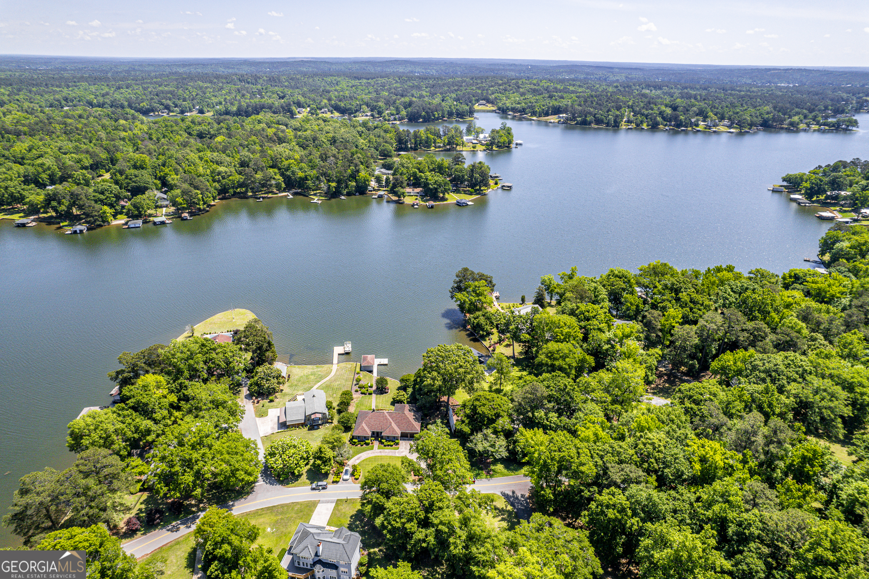 104 Spruce Point Southeast Eatonton, GA 31024 - Photo 55 of 63 an aerial view of a houses with a lake view
