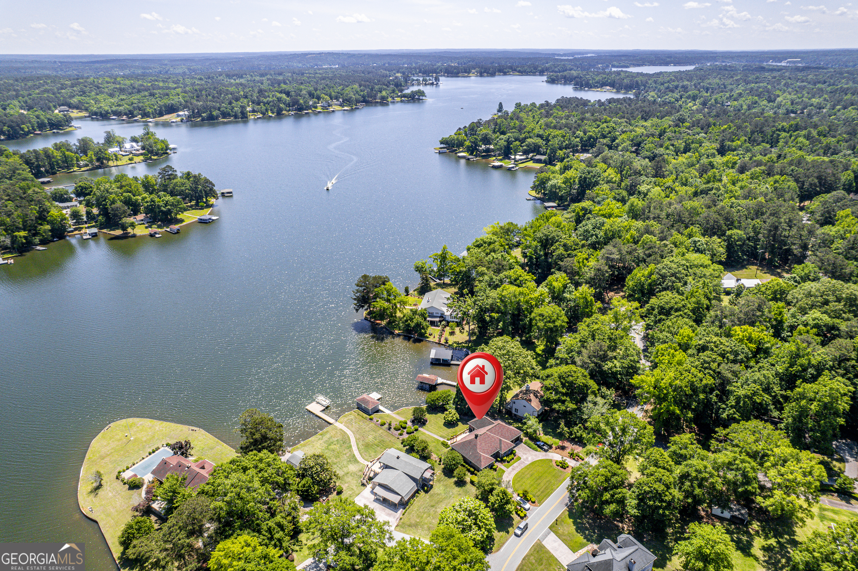 104 Spruce Point Southeast Eatonton, GA 31024 - Photo 62 of 63 a view of a lake with a mountain view