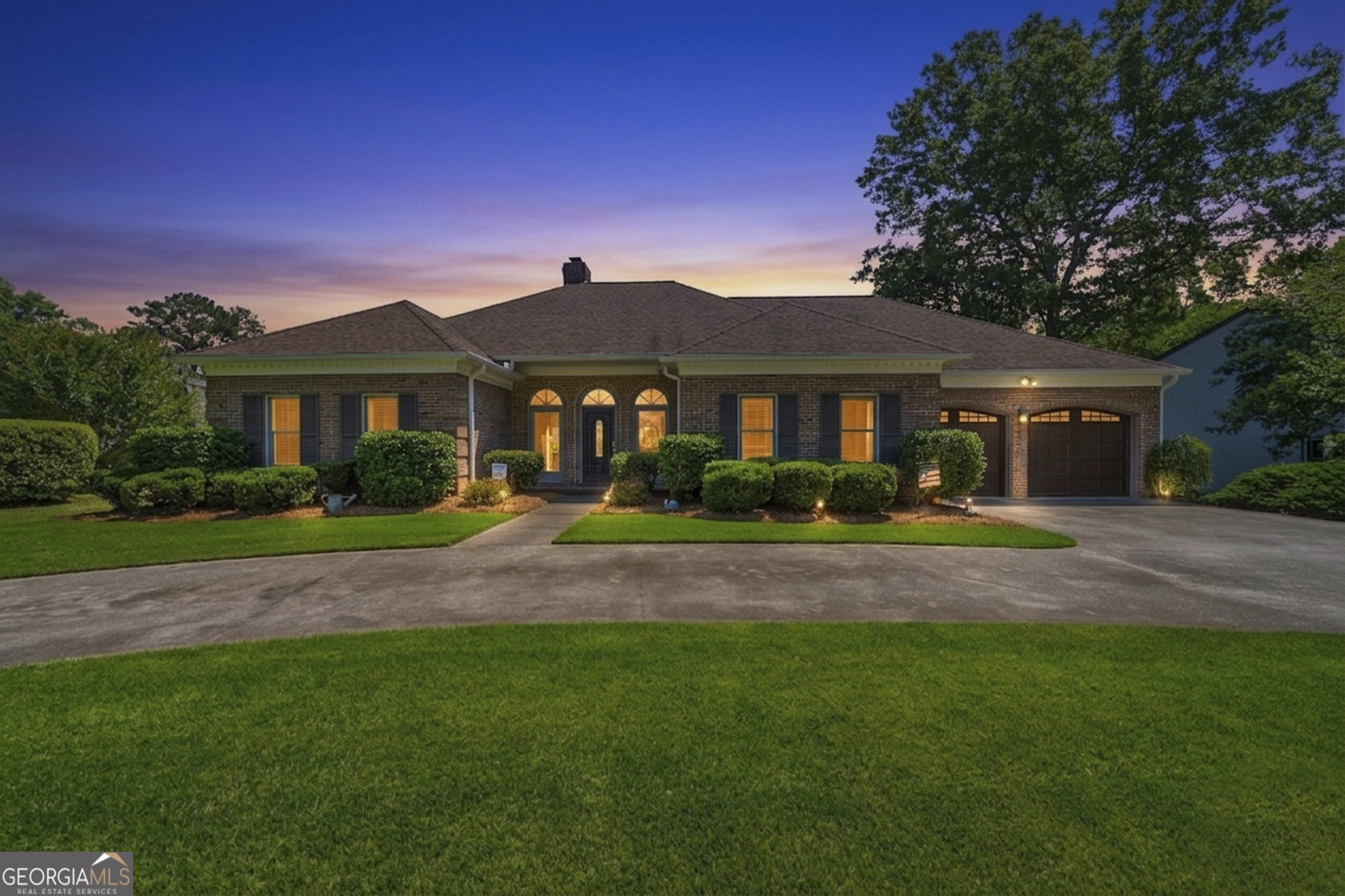 104 Spruce Point Southeast Eatonton, GA 31024 - Photo 63 of 63 a front view of a house with a yard