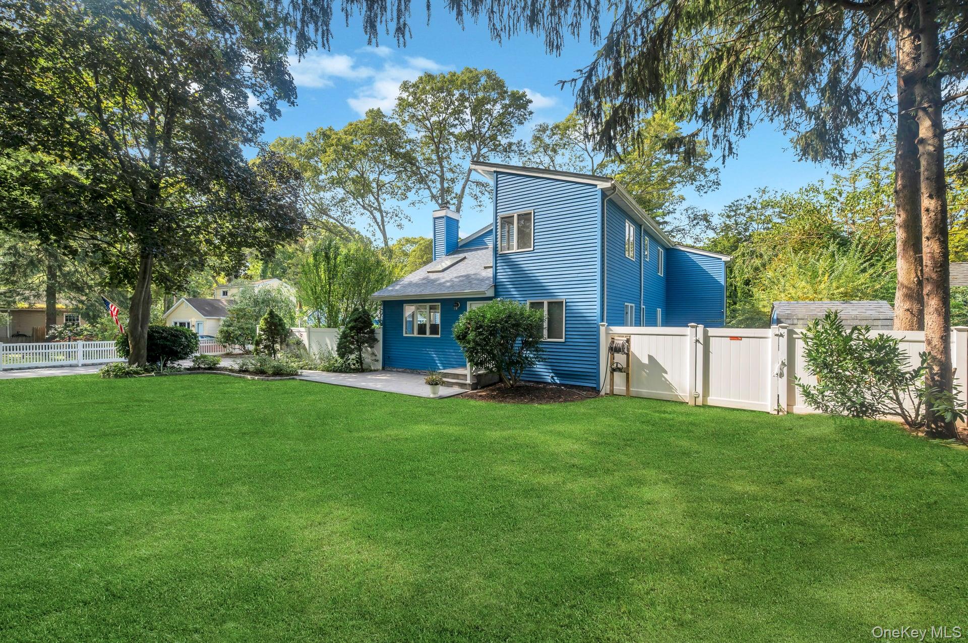 a view of a house with a back yard