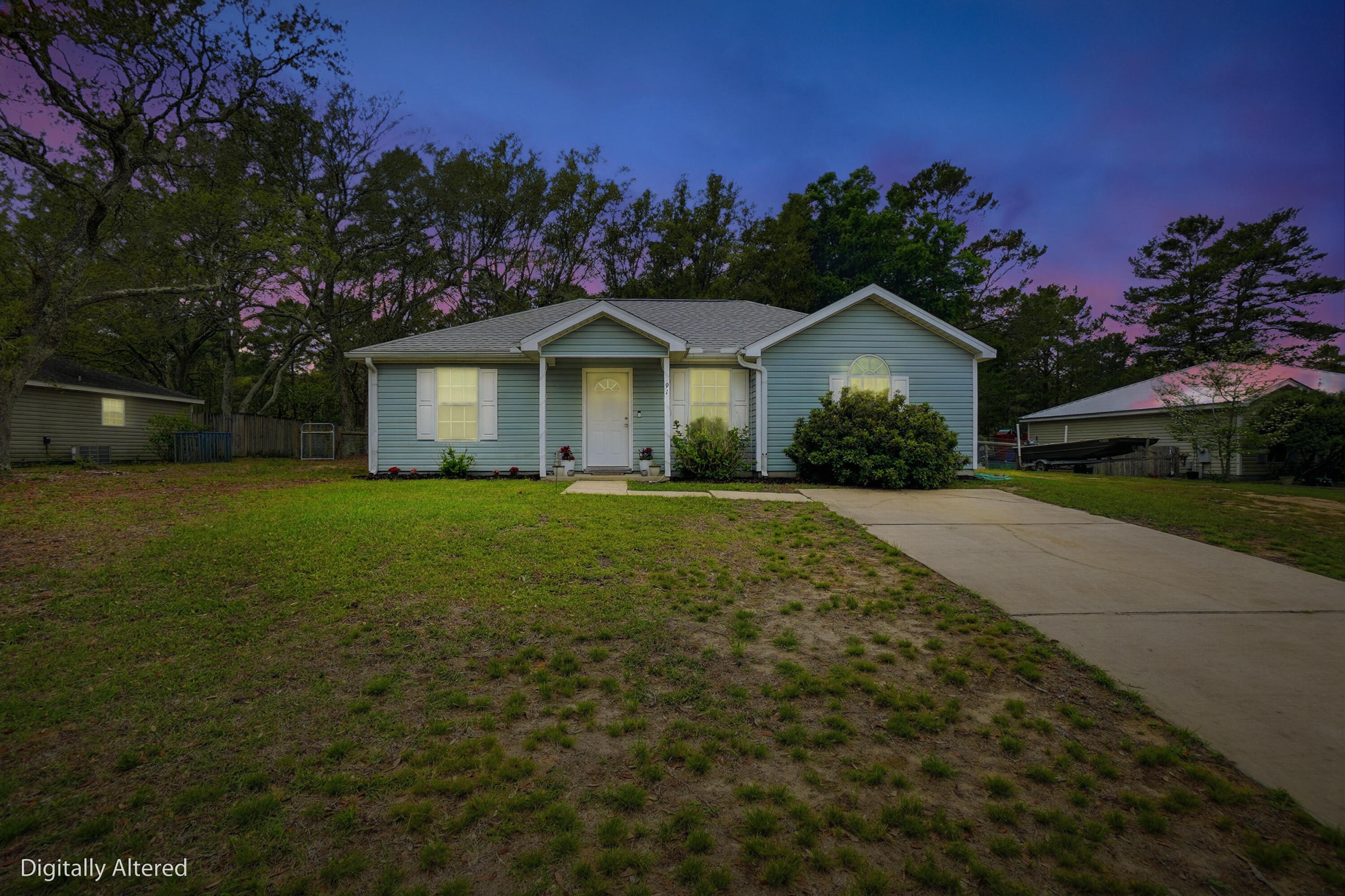 91 Oakridge Way DeFuniak Springs, FL 32433 - Photo 1 of 25 a front view of a house with garden