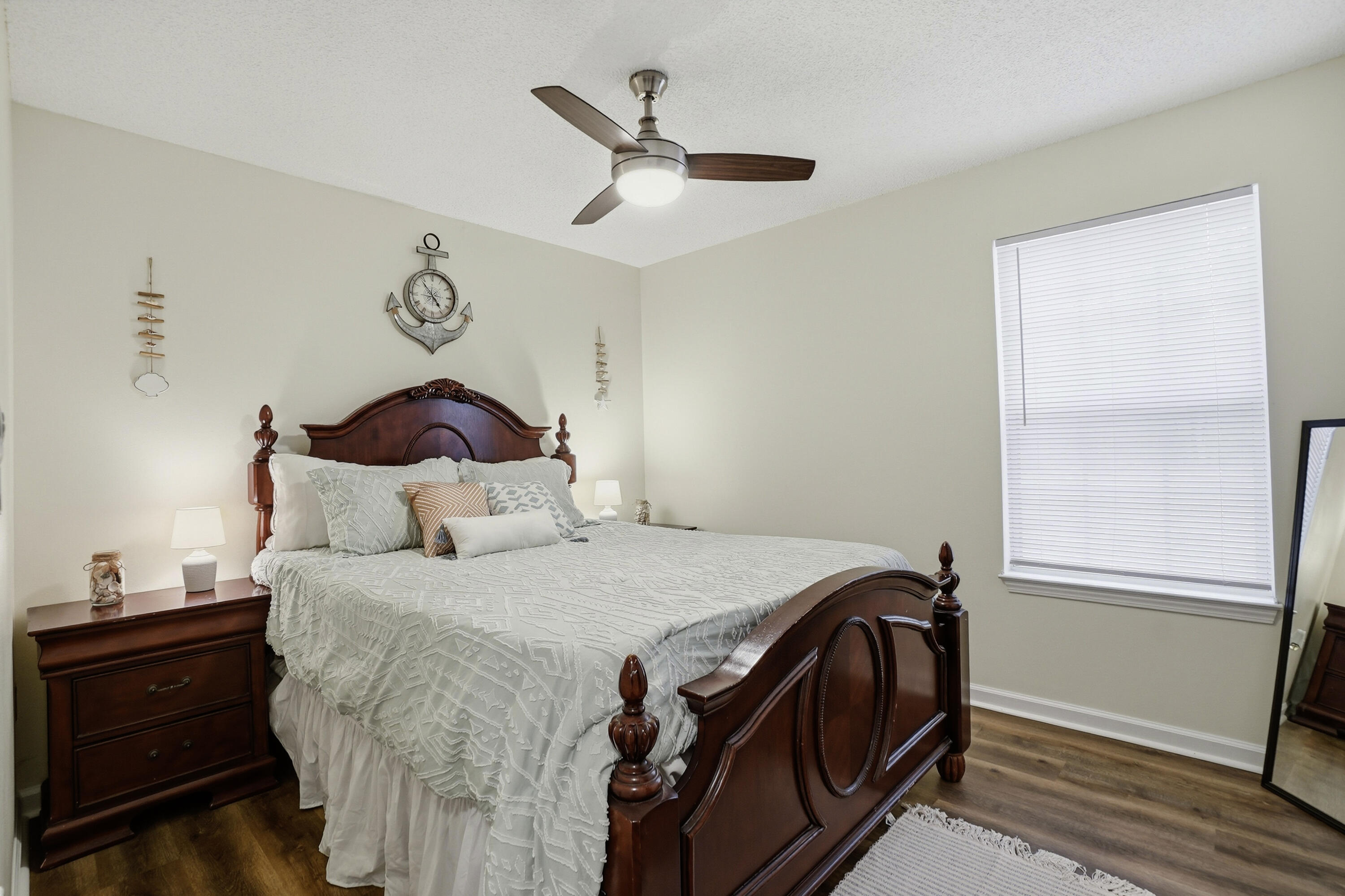 91 Oakridge Way DeFuniak Springs, FL 32433 - Photo 18 of 25 a bedroom with a bed and a window