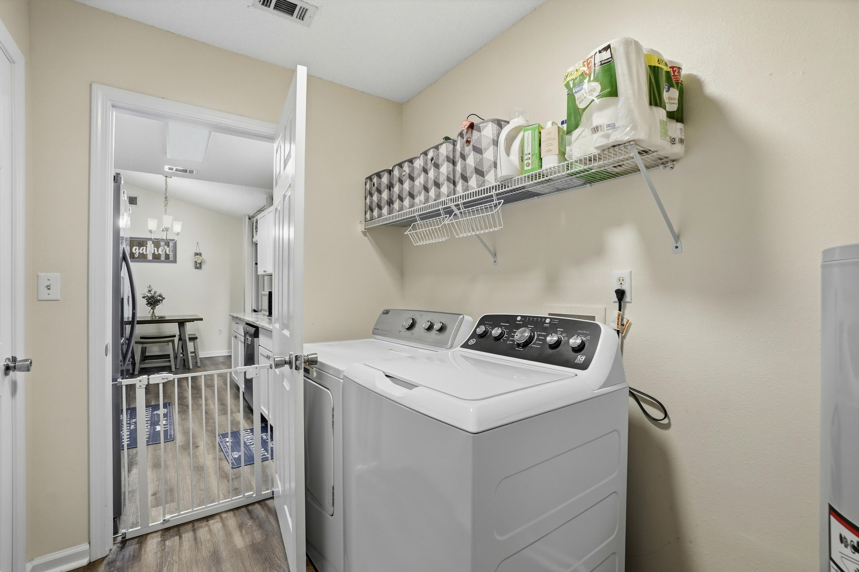 91 Oakridge Way DeFuniak Springs, FL 32433 - Photo 19 of 25 a utility room with dryer and washer