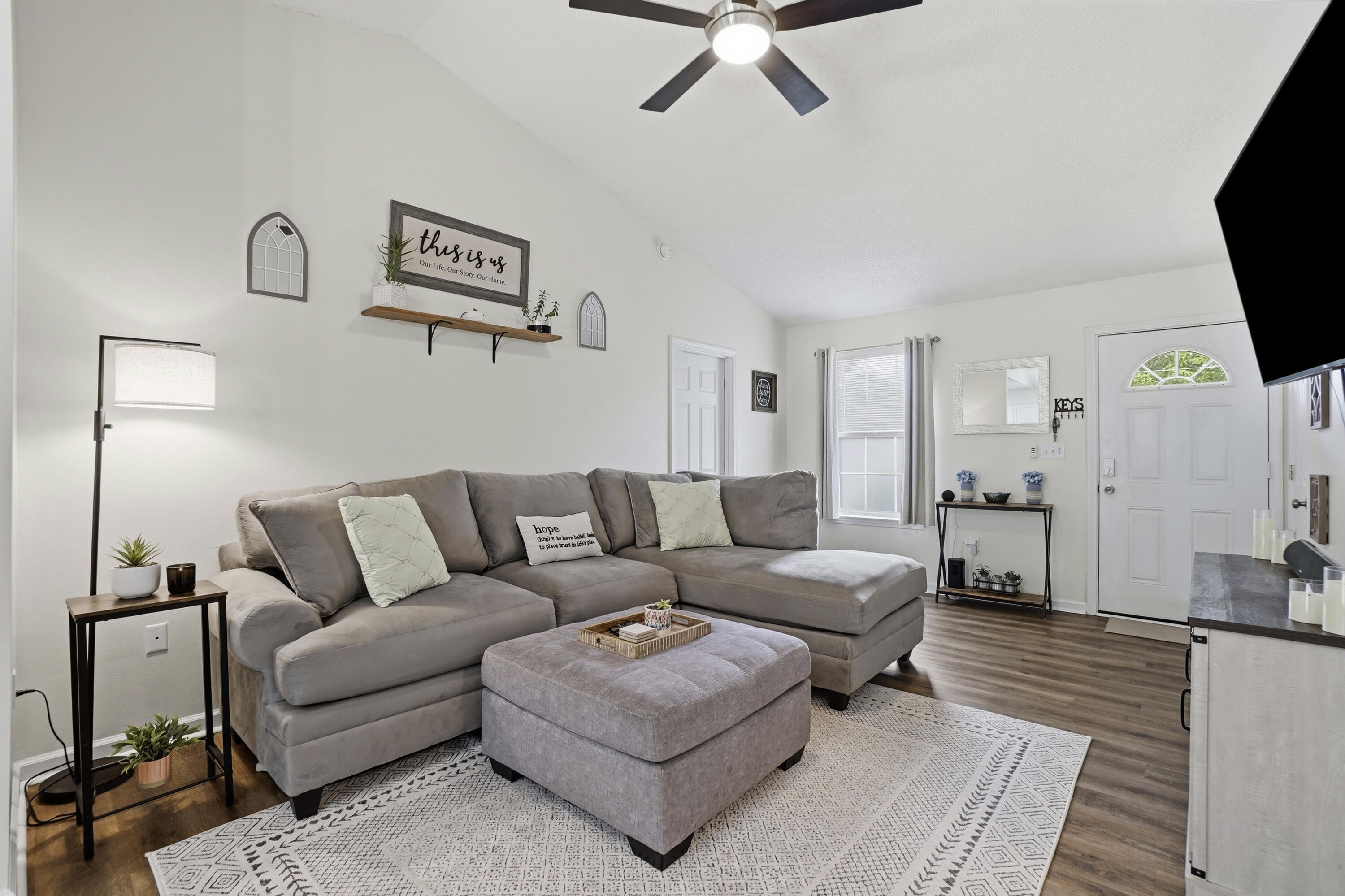 91 Oakridge Way DeFuniak Springs, FL 32433 - Photo 3 of 25 a living room with furniture and a flat screen tv