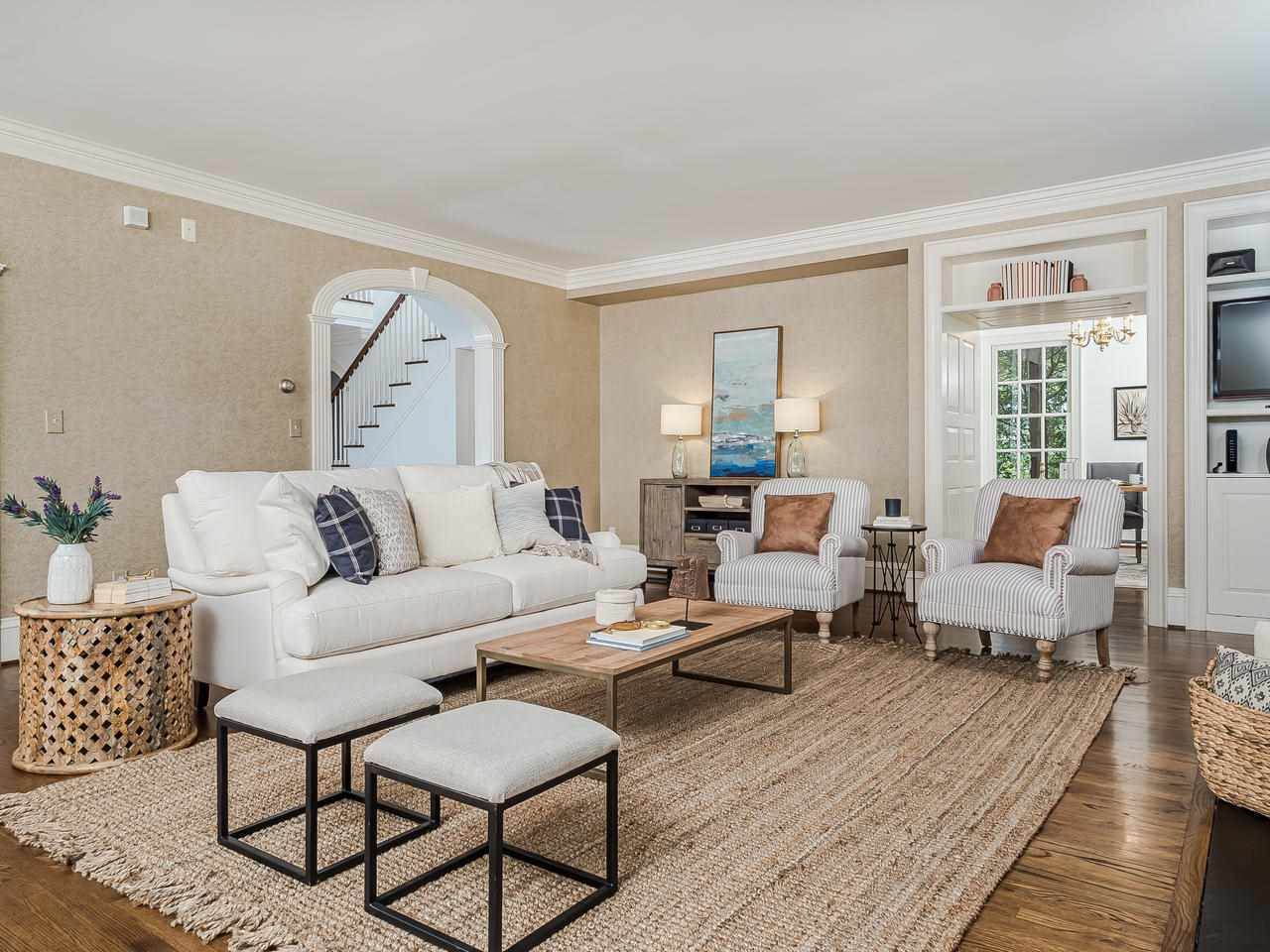 1913 Lewis Circle Raleigh, NC 27608 - Photo 14 of 30 Family Room is the Hub Opens to Veranda, Kitchen Study, Foyer, and Dining Room Family Room