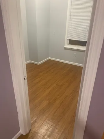 a bathroom with a bathtub and a toilet