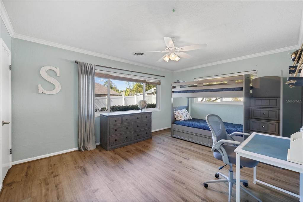 2149 Wason Road Sarasota, FL 34231 - Photo 18 of 32 a room with furniture and wooden floor