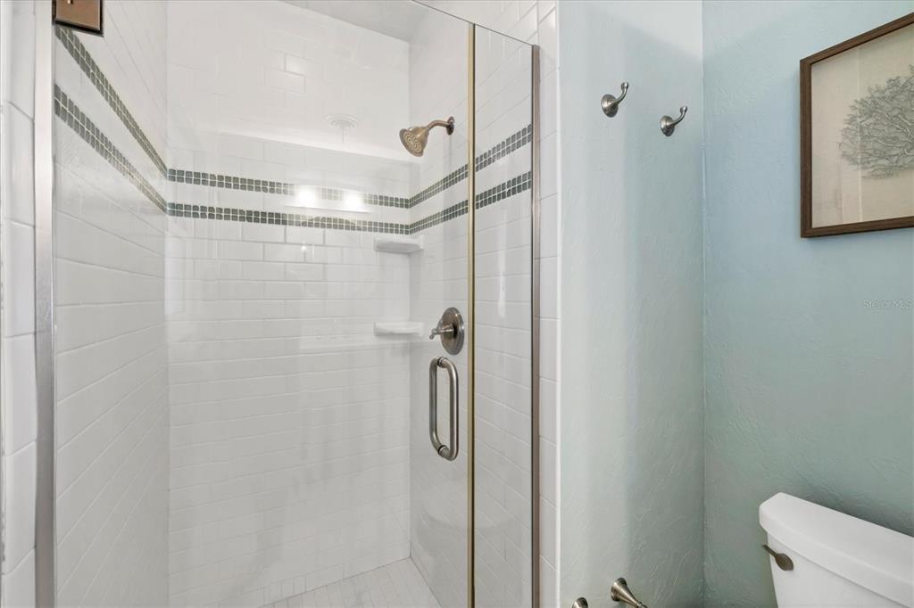 2149 Wason Road Sarasota, FL 34231 - Photo 21 of 32 a bathroom with a shower