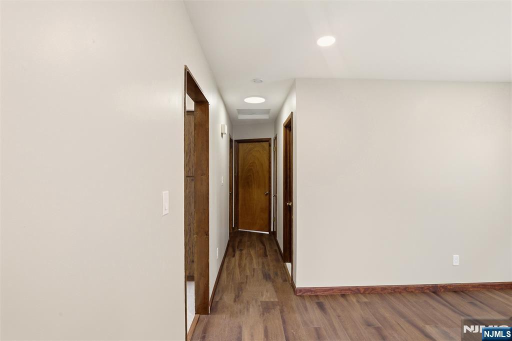70 Wood Street, Unit 2 Garfield, NJ 07026 - Photo 11 of 23 a view of a hallway with wooden floor