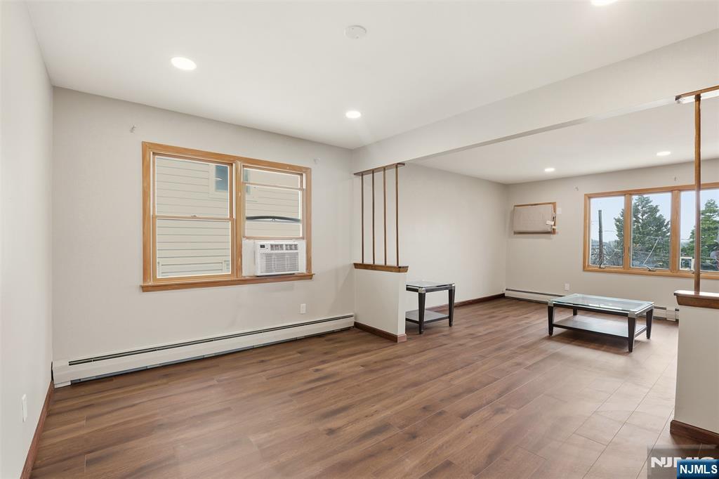 70 Wood Street, Unit 2 Garfield, NJ 07026 - Photo 7 of 23 a view of workspace with furniture and windows