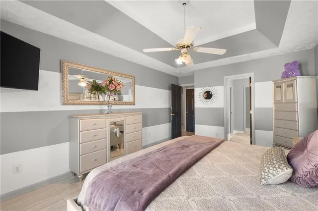 a white bath tub sitting next to a window