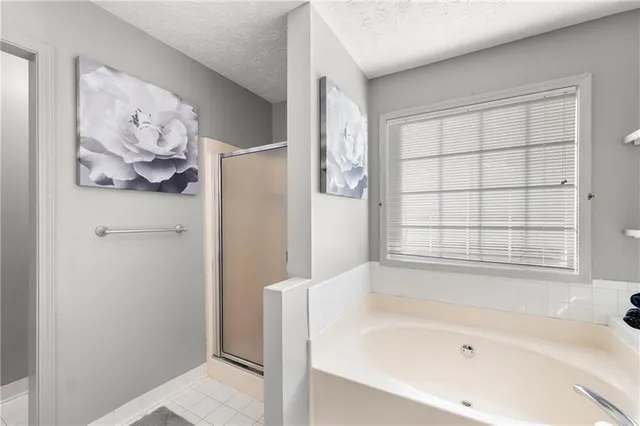 a view of living room with granite countertop furniture and fireplace
