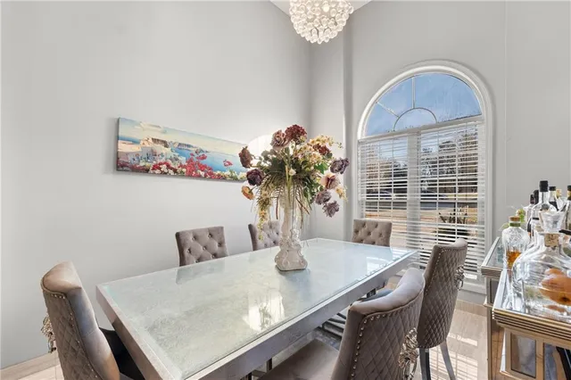 a kitchen with stainless steel appliances kitchen island granite countertop a sink and cabinets